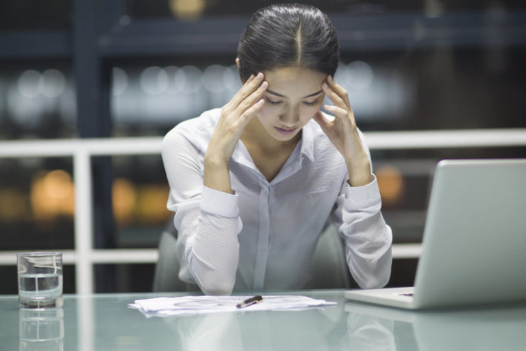 Young businesswoman working in office